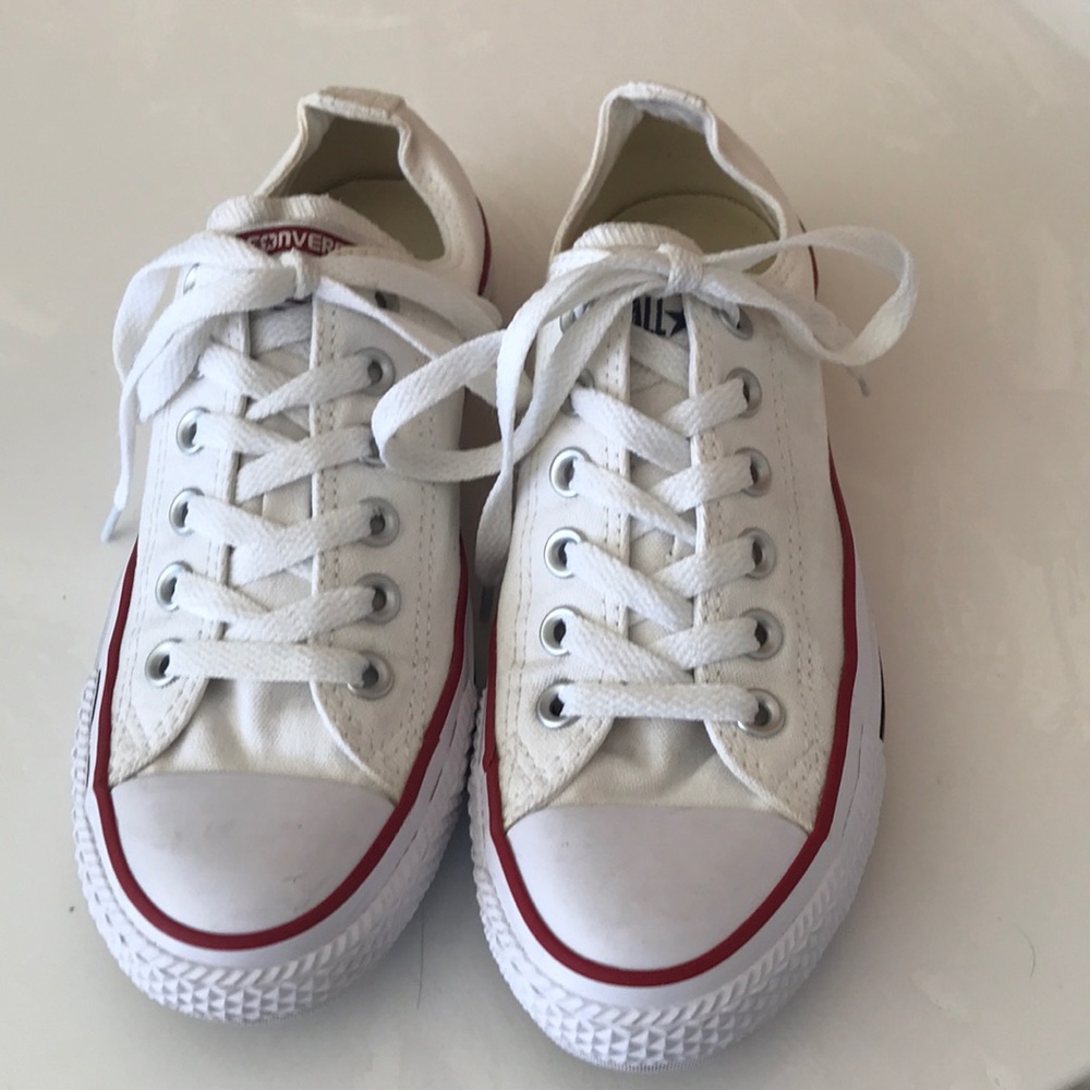 White Chuck Taylor tennis shoes